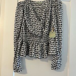 Ryegrass patterned blouse.